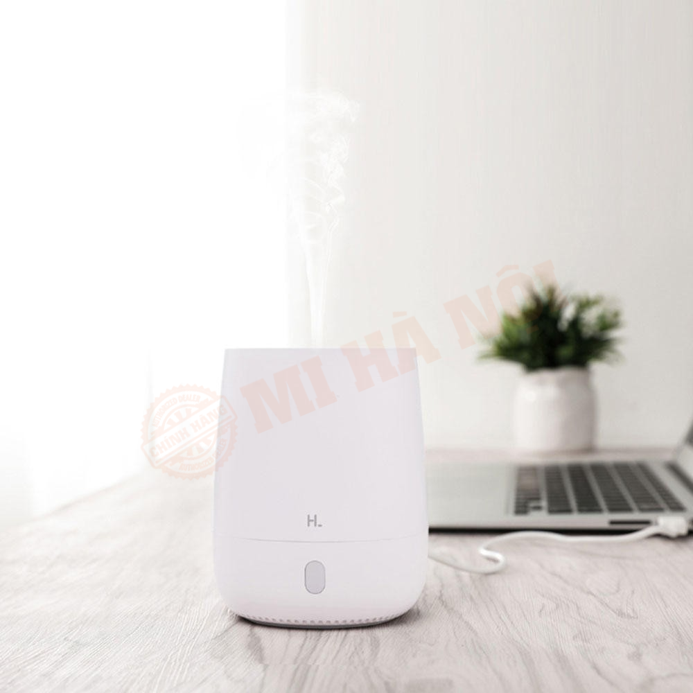 Máy tạo độ ẩm mini Happy Life có thiết kế hình trụ khá đơn giản, chỉ với một nút bấm để điều chỉnh